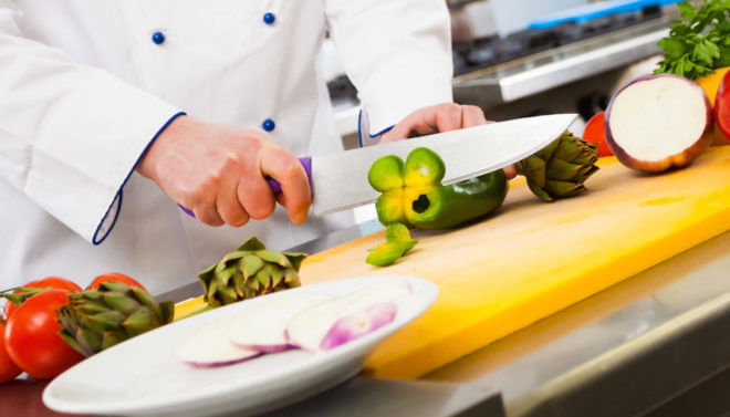 chef slicing vegetables