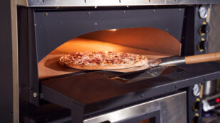 pizza in pizza oven